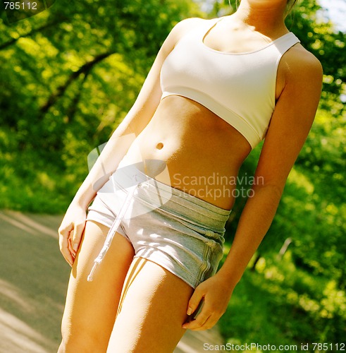 Image of Young Woman Working Out