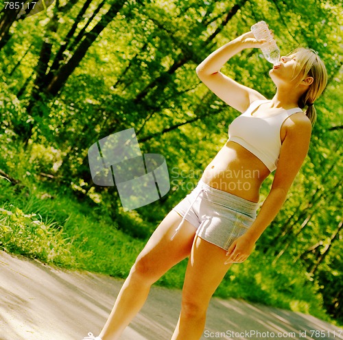 Image of Young Woman Working Out