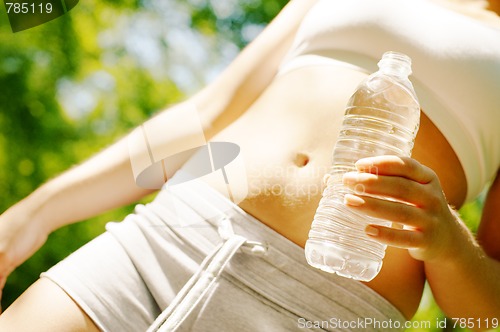 Image of Young Woman Working Out