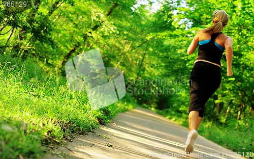 Image of Young Woman Working Out