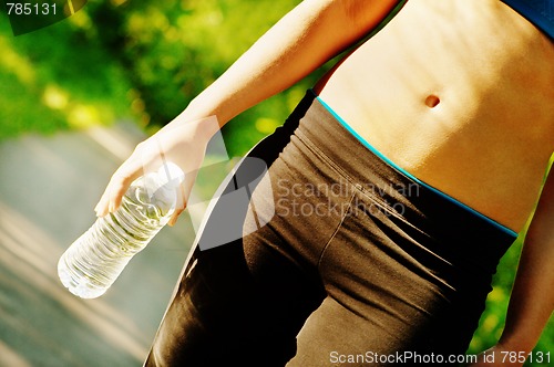 Image of Young Woman Working Out