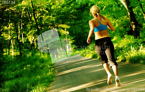 Image of Young Woman Working Out