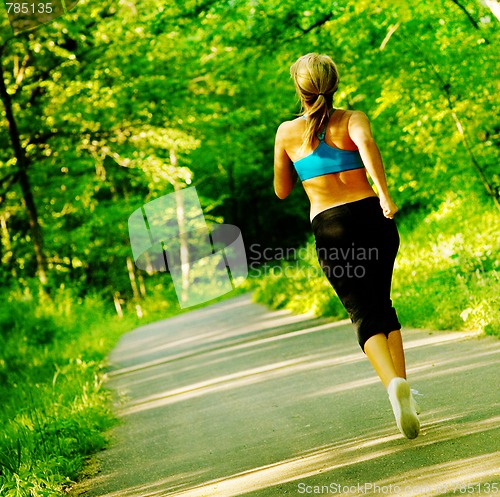 Image of Young Woman Working Out