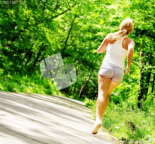 Image of Young Woman Working Out