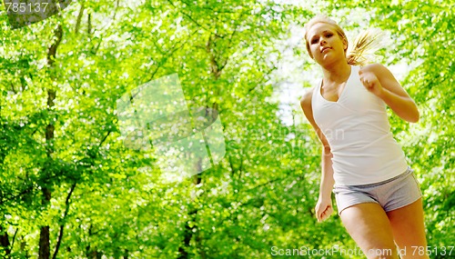 Image of Young Woman Working Out