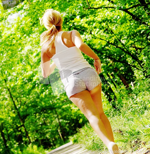 Image of Young Woman Working Out