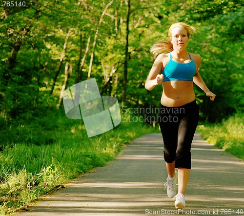 Image of Young Woman Working Out