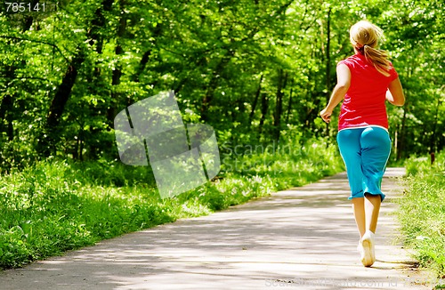 Image of Young Woman Working Out