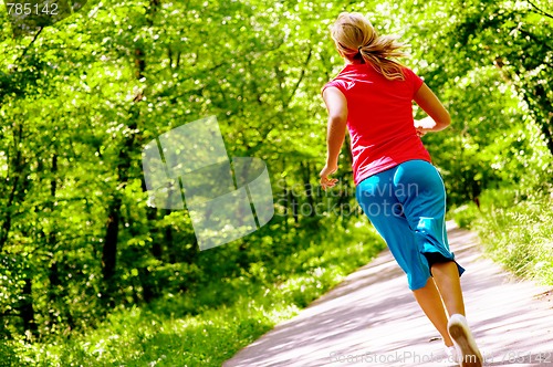 Image of Young Woman Working Out