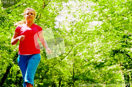 Image of Young Woman Working Out