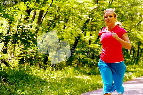 Image of Young Woman Working Out