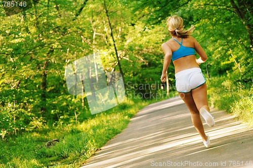 Image of Young Woman Working Out
