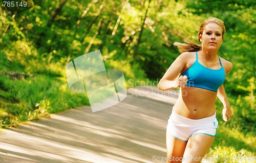 Image of Young Woman Working Out