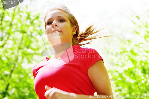 Image of Young Woman Working Out
