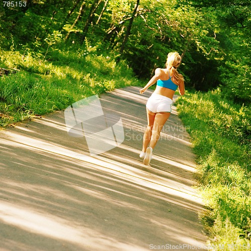 Image of Young Woman Working Out