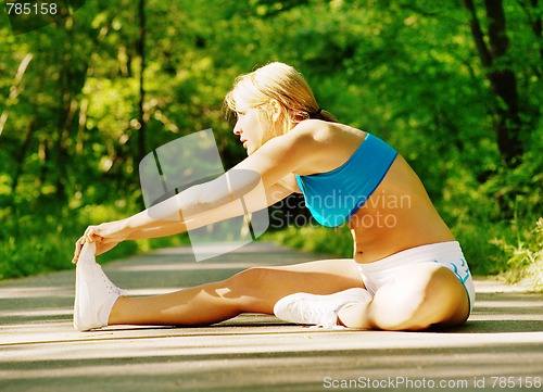 Image of Young Woman Working Out