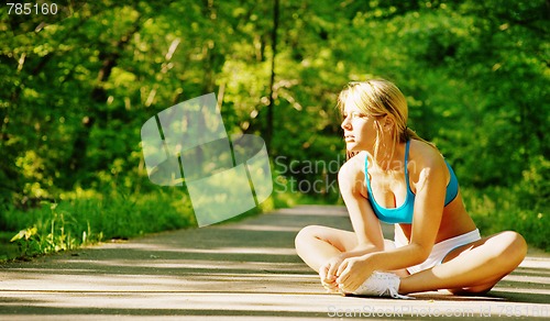 Image of Young Woman Working Out