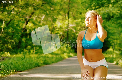 Image of Young Woman Working Out