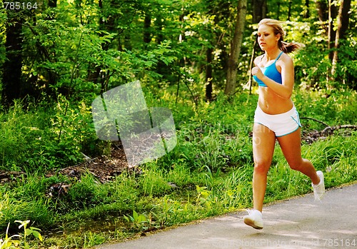 Image of Young Woman Working Out