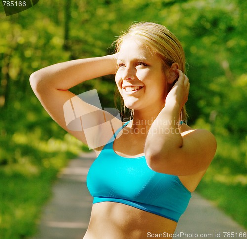 Image of Young Woman Working Out