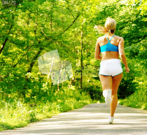 Image of Young Woman Working Out