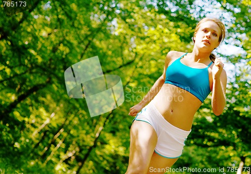 Image of Young Woman Working Out