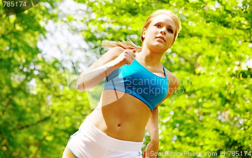 Image of Young Woman Working Out