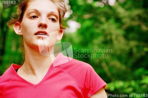 Image of Woman In Red Running