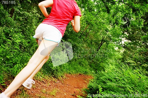 Image of Woman In Red Running