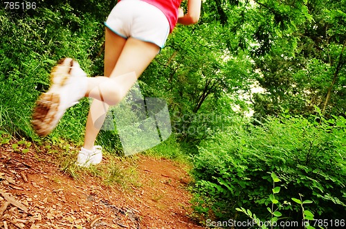 Image of Woman In Red Running