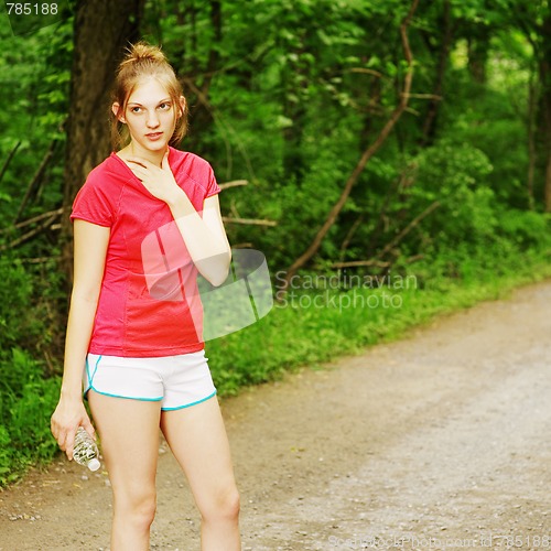 Image of Woman In Red Running