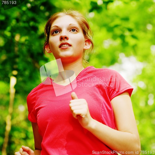 Image of Woman In Red Running