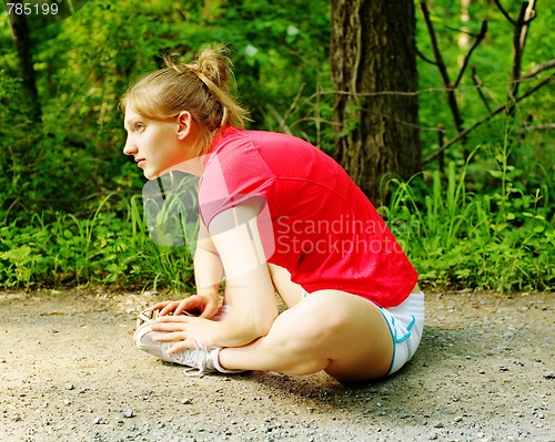 Image of Woman In Red Running