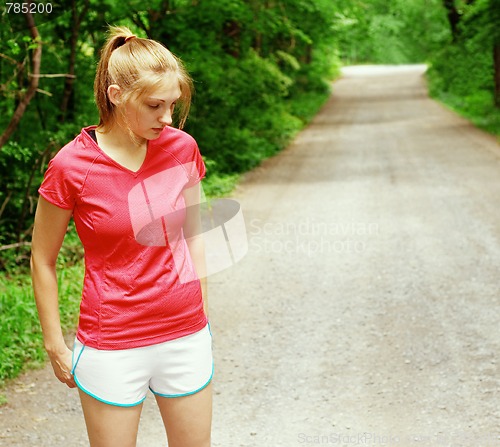 Image of Woman In Red Running