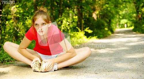 Image of Woman In Red Running