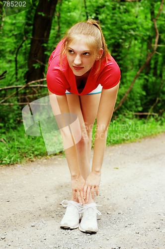 Image of Woman In Red Running