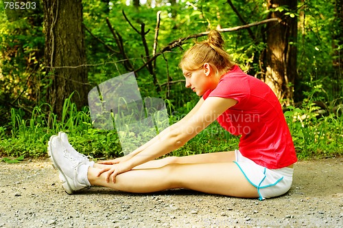 Image of Woman In Red Running