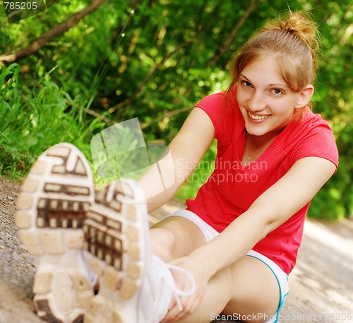 Image of Woman In Red Running