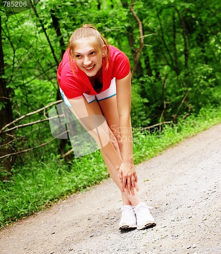 Image of Woman In Red Running