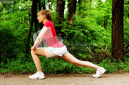 Image of Woman In Red Running