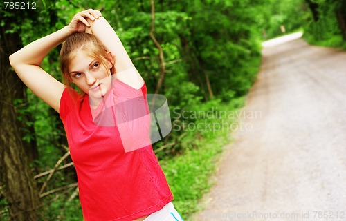 Image of Woman In Red Running