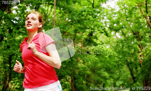 Image of Woman In Red Running