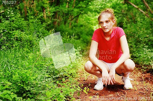 Image of Woman In Red Running