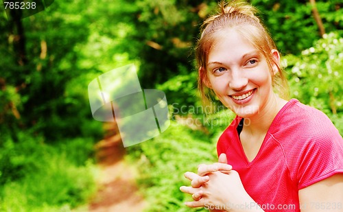 Image of Woman In Red Running