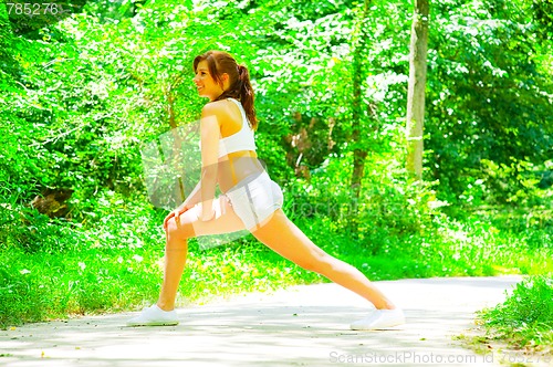 Image of Woman Runner In The Woods