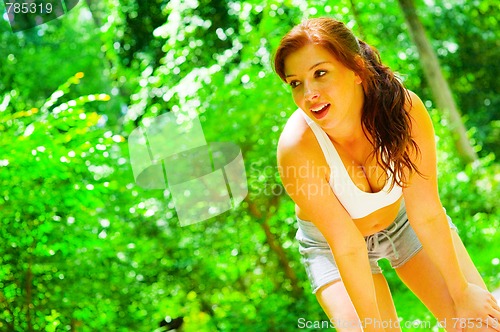 Image of Woman Runner In The Woods