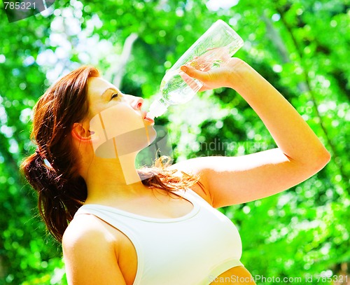 Image of Woman Runner In The Woods