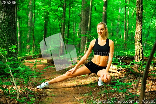 Image of Blonde Woman Exercising 