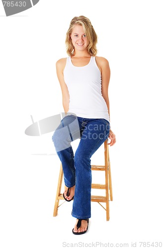 Image of Casual Woman Sitting On A Small Ladder