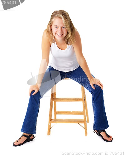 Image of Casual Woman Sitting On A Small Ladder